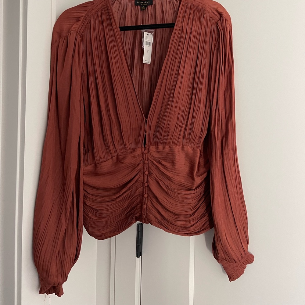 Terracotta colored plunge button up Anthropologie shirt